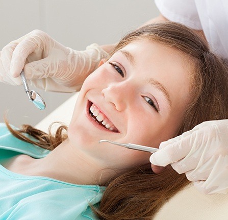 Young patient smiling during children's dentistry visit