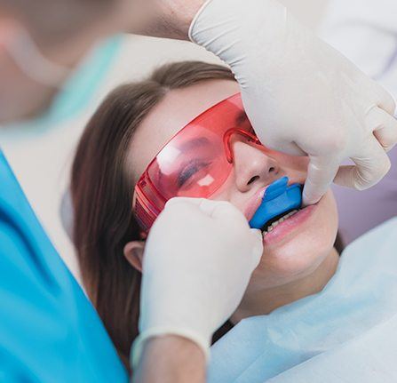 Patient receiving fluoride treatment