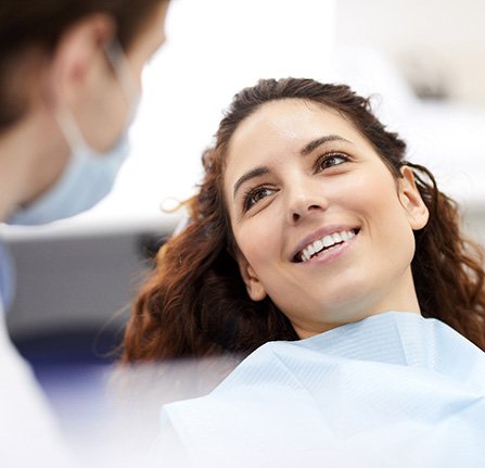 Female dental patient after getting tooth-colored fillings in Mt. Pleasant, WI