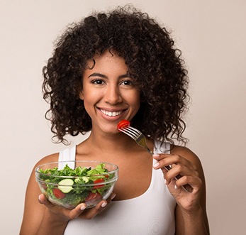 Woman eating a salad in Mt. Pleasant