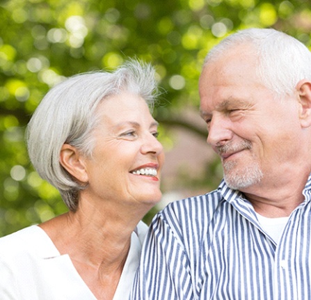 Couple with dental implant supported dentures in Mt. Pleasant