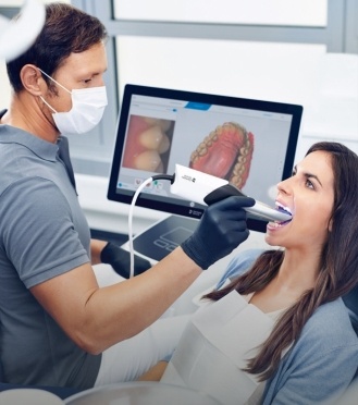 Dentist capturing digital bite impressions