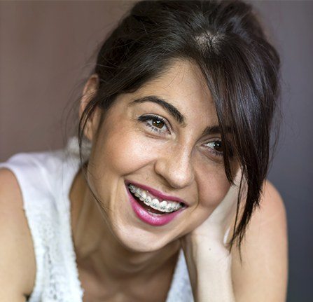 Smiling woman with braces