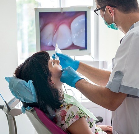 Dentist capturing intraoral images