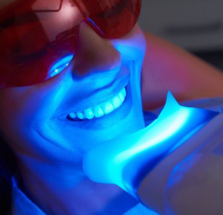 woman getting in-office teeth whitening in Milwaukee