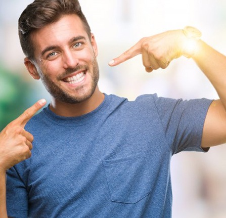 Man enjoying the benefits of professional teeth whitening