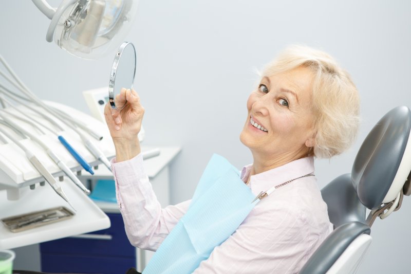Mature woman with dental implants
