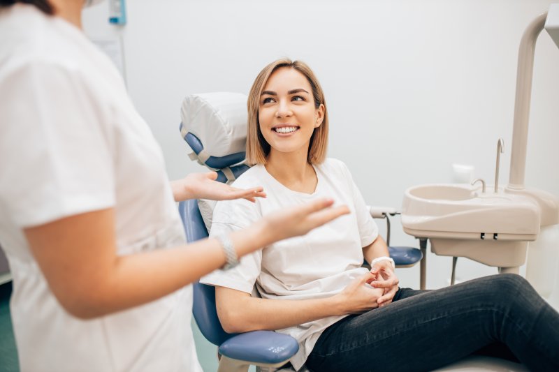 person smiling after having small teeth fixed