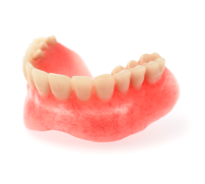 a closeup of a lower denture